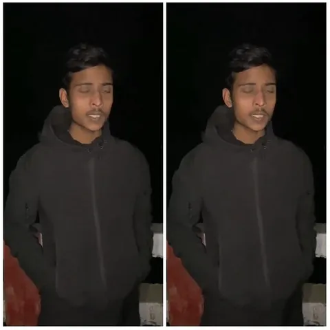 Young Person on Night Balcony