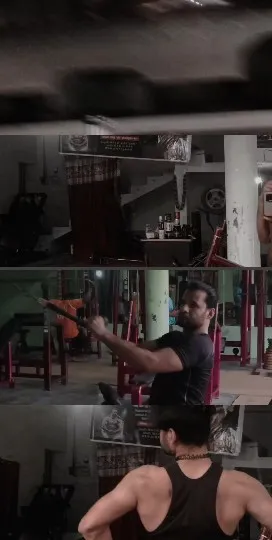 Gym Equipment and Exercising Person
