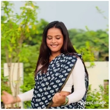 Woman in Sari Outdoors Smiling