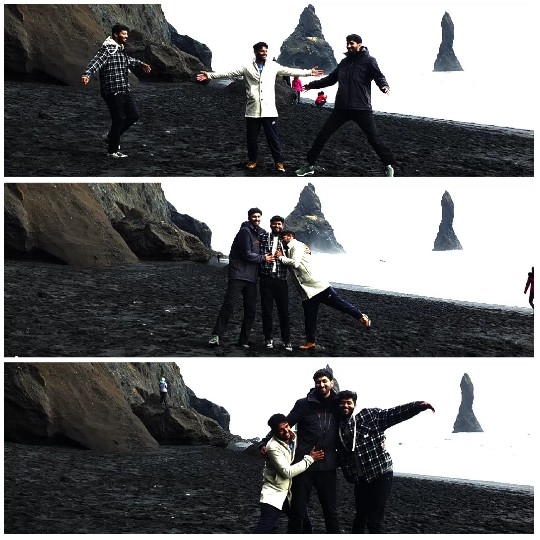 Friends Posing on Rocky Beach