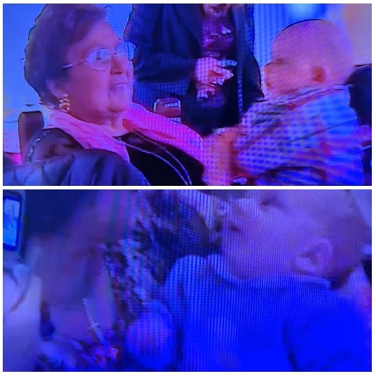 Smiling Woman with Babies in Focus