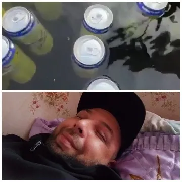 Cans Floating and Person Resting