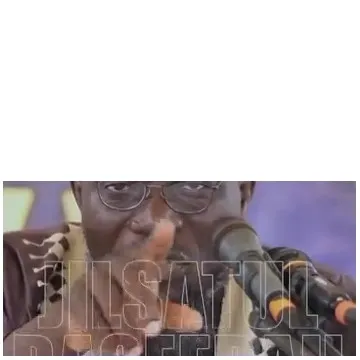 Person Speaking into Microphone