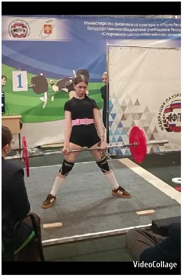 Woman Weightlifting in a Gym