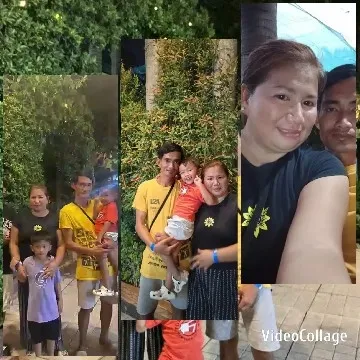 Family Posing Together with Greenery