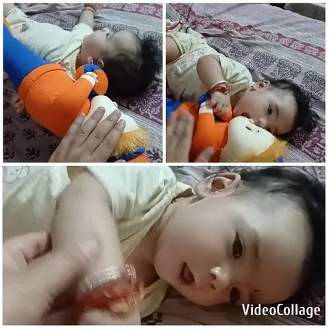 Baby Playing with Colorful Toy