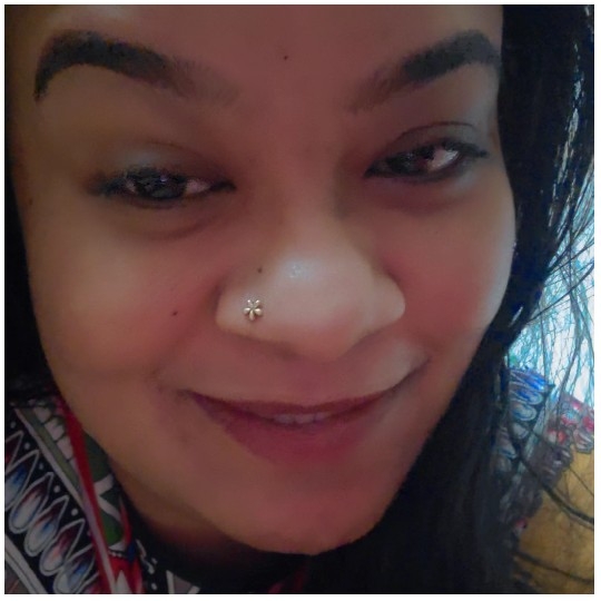 Close-Up of Smiling Person with Piercing
