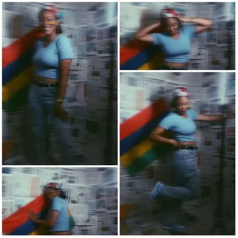 Person with Flag Among Newspapers
