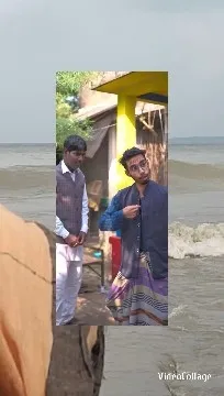 Individuals at Beach Near Yellow Structure