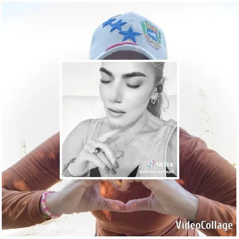Woman Making Heart Shape with Hands