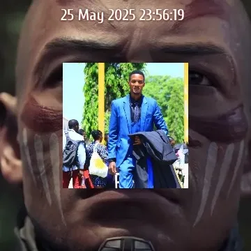 Person in Blue Suit with Backdrop