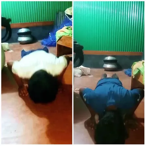 Two People Exercising Indoors