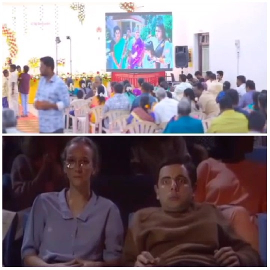 Audience Watching Event on Big Screen