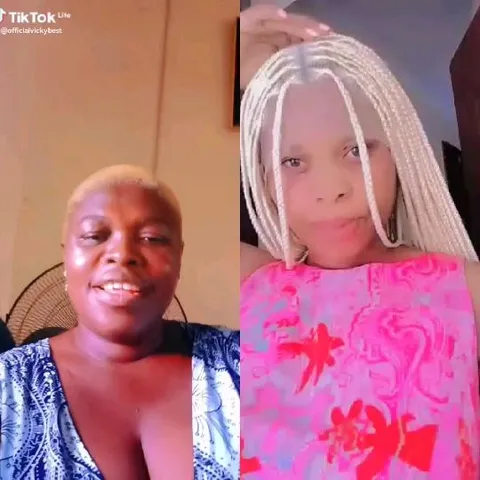 Two People Posing for Selfies