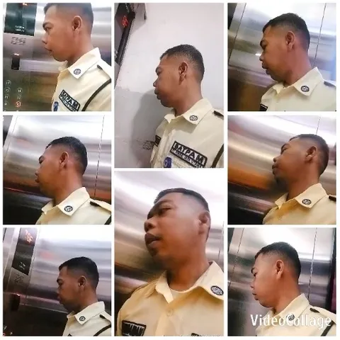 Person in Uniform Inside Elevator