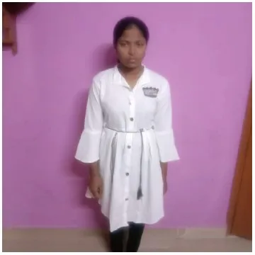 Woman in White Dress by Wall