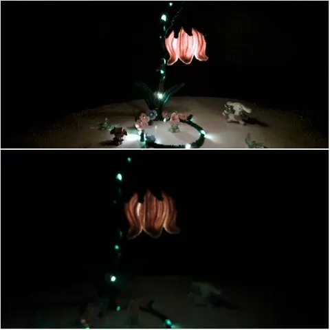 Glowing Flower Sculpture with Figurines