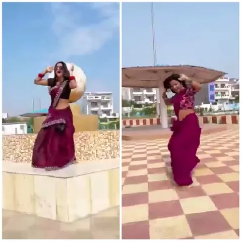 Woman in Purple Saree Dancing Outdoors