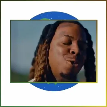 Close-Up of Smiling Person with Braids