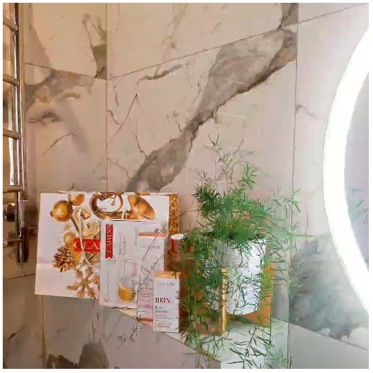 Skincare Products on Marble Shelf