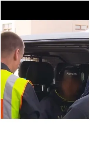 Officer Interacting with Subdued Individual