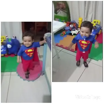 Child Dressed as Superman Indoors