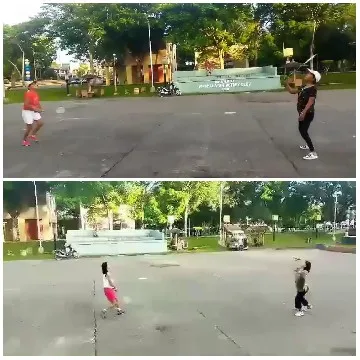 Playing Badminton In Outdoor Park