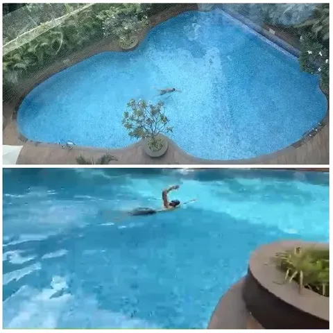 Swimming Pool with Person in Action