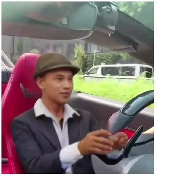 Driver in Car with Hat