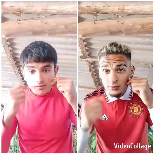 Two Men in Red Shirts Posing