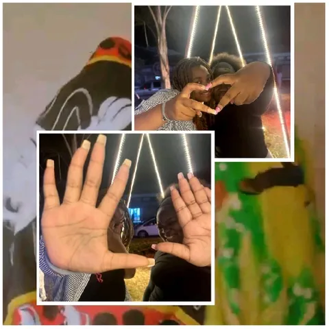 Two People Posing with Hand Gestures