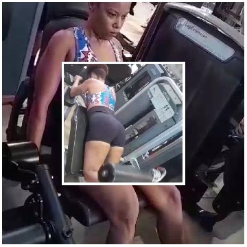 Woman Using Gym Equipment