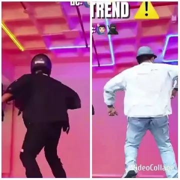 Two Individuals Dancing Under Lights
