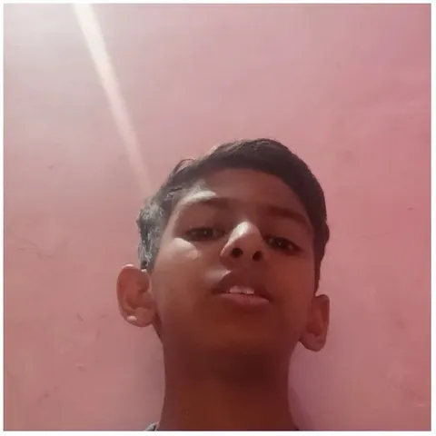 Young Person Against Pink Background