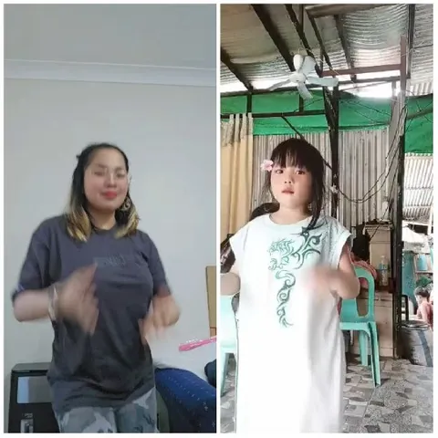 Dancing Adult and Standing Girl