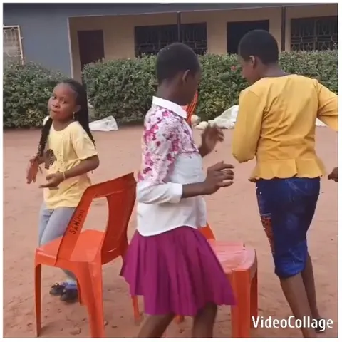 Children Playing Game with Plastic Chairs