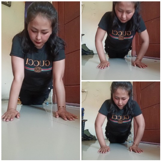 Woman Performing Push-Ups Indoors