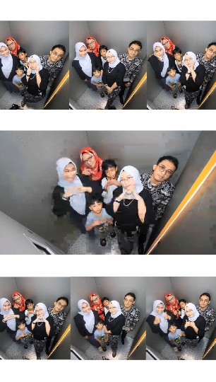 Group Smiling Together in Elevator