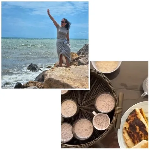 Person Gesturing by the Sea