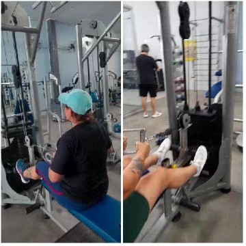 Two People Working Out at the Gym