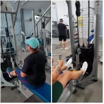 Two People Working Out at the Gym
